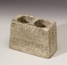 Cosmetic Container with Round Receptacles and Inscriptions