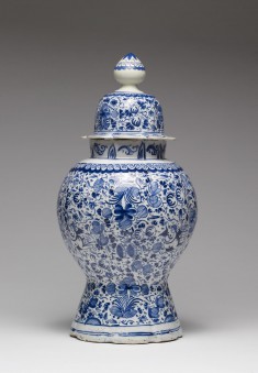 Delftware Covered Vase with Angels Among a Floral Design