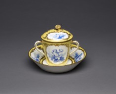 Two-Handled Covered Cup and Saucer