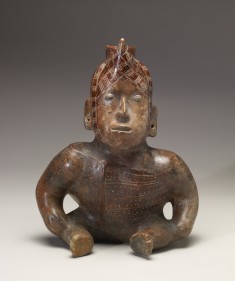 Seated Dwarf Shaman with Horn on Forehead and Hands on the Knees