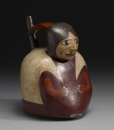 Effigy Vessel of a Seated Figure with Long Tunic