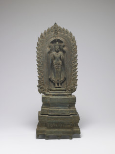Standing Buddha on Throne