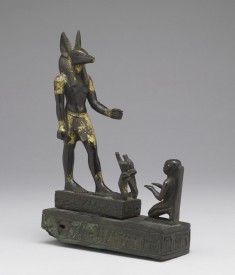 A Worshipper Kneeling Before the God Anubis