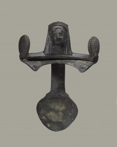 Handle with the Head of a Woman