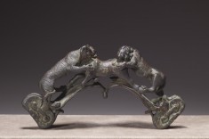 Handle Depicting a Lion and a Tigress Attacking a Bull