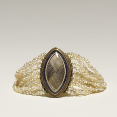 One of a Pair of Pearl Bracelets with Hair Inlays