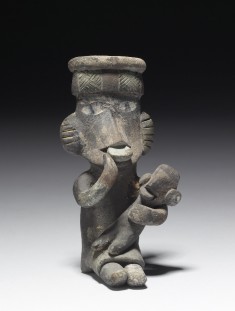 Seated Female Holding Child