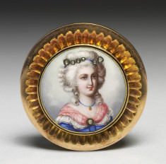 Brooch with image of a woman on porcelain