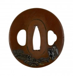 Tsuba with a Crow and a Heron on a Pine Branch in Rain
