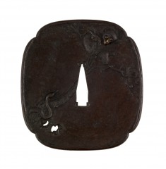 Tsuba with a Snake and a Monkey on a Pine Branch