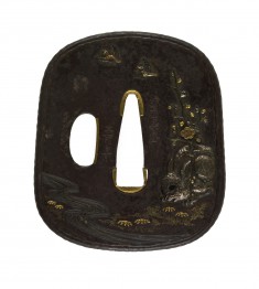Tsuba with Stone Rabbit with a Blossoming Plum Branch
