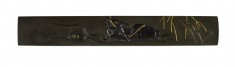 Kozuka with a Man on an Ox in a Stream