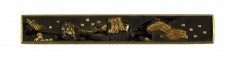 Kozuka with A Man Leading an Ox with Sheaves of Rice