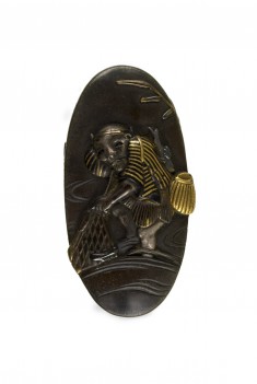 Kashira with a Man Fishing with a Net