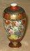 Vase with Elaborate Flowers and Geometric Designs Thumbnail