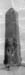 Figure of a Lion-Headed Goddess in Front of an Obelisk Thumbnail