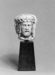 Paternoster Bead from a Rosary or Chaplet with Christ, a Young Woman, and Death Thumbnail