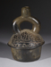 Stirrup spout vessel with supernatural being's head Thumbnail