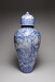 Arita Ware Covered Jar with a Panel Depicting a Collection of Antiques in a Chinese Garden Thumbnail