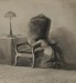 Thumbnail: Girl Kneeling Over the Arm of a Chair