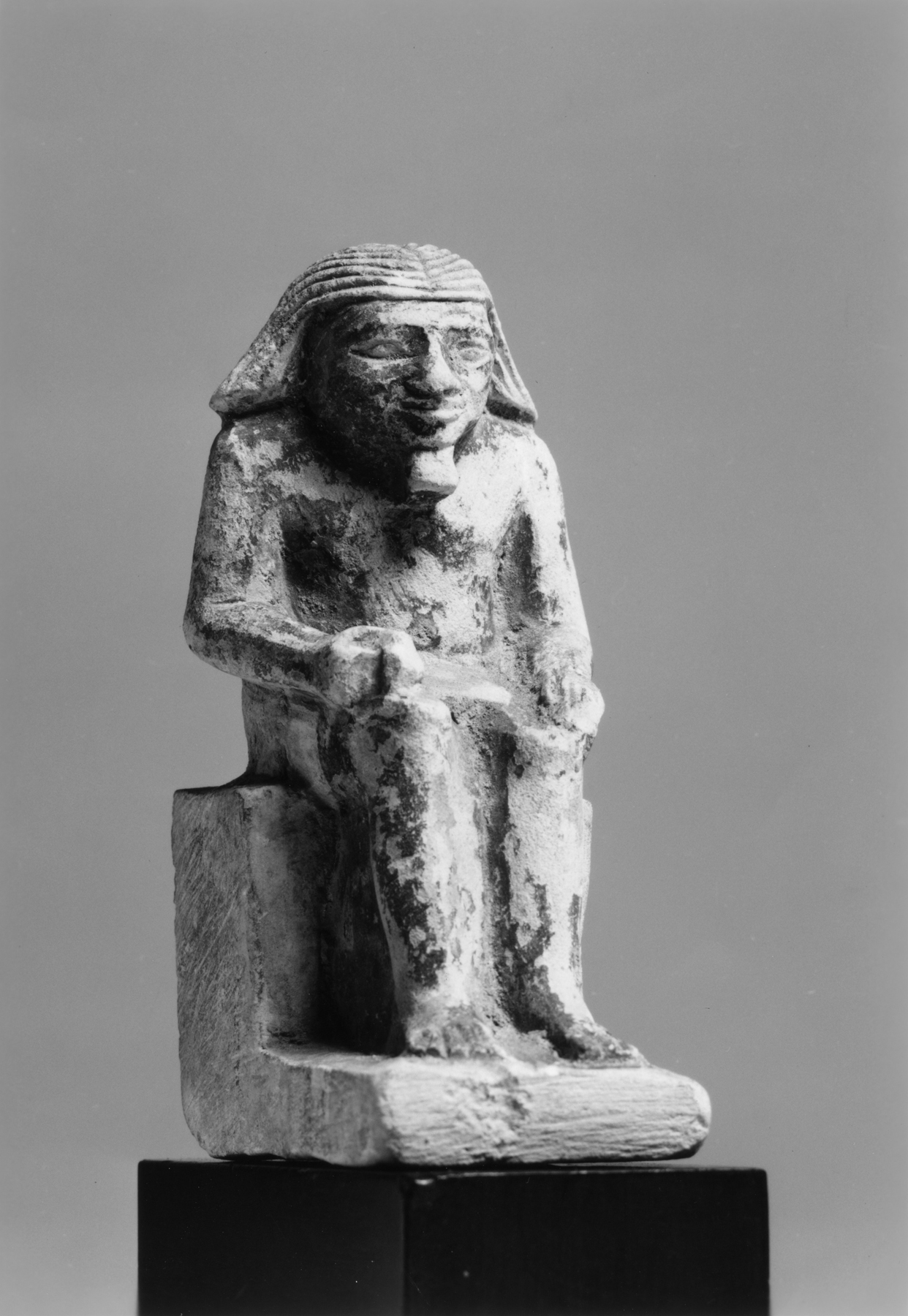 Male Figure Seated