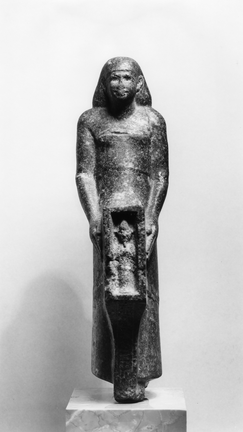 Man Holding a Shrine Containing a Figure of Osiris
