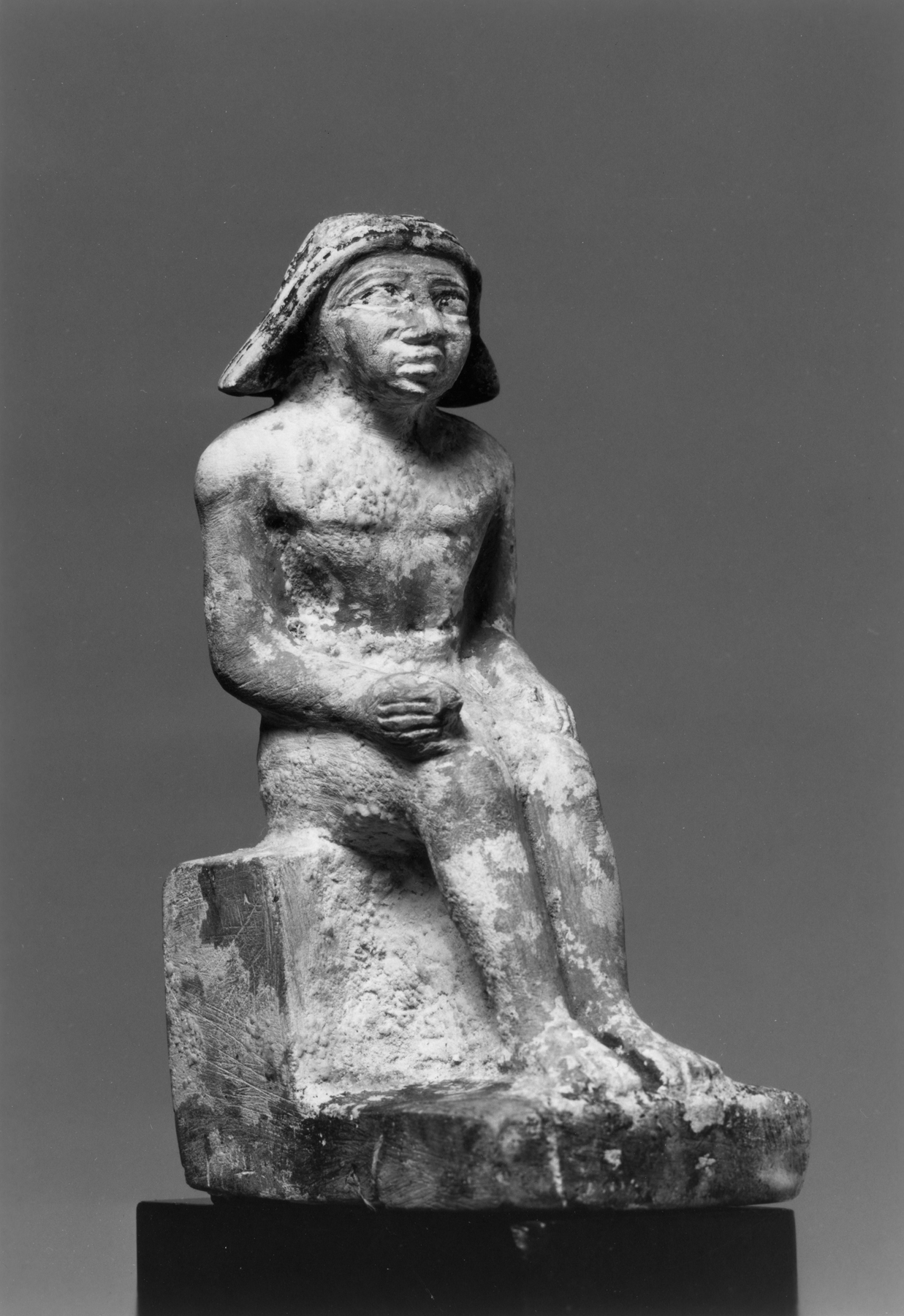 Male Figure Seated