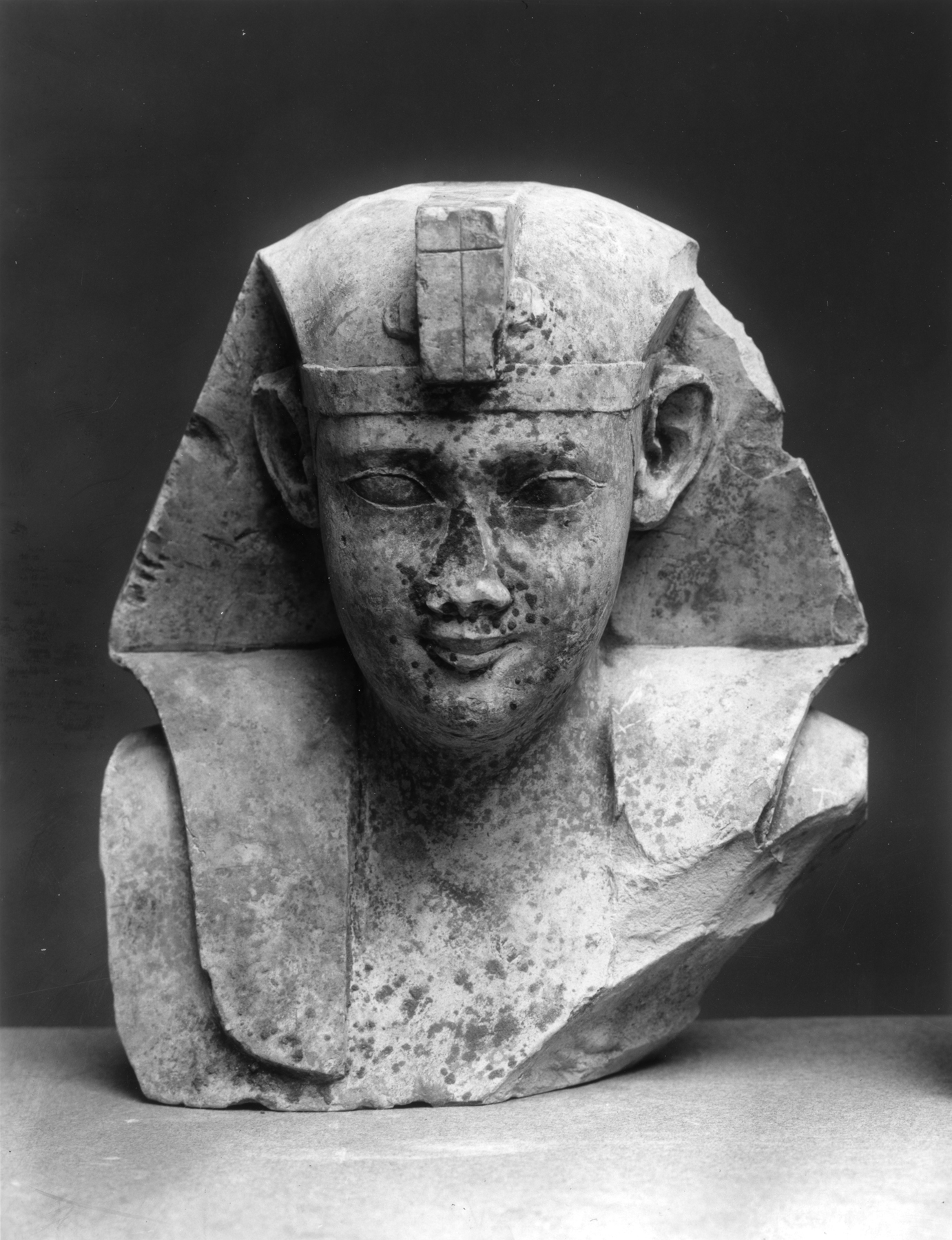 Bust of a King with Unfinished ""Uraeus"" (Cobra) and Grid
