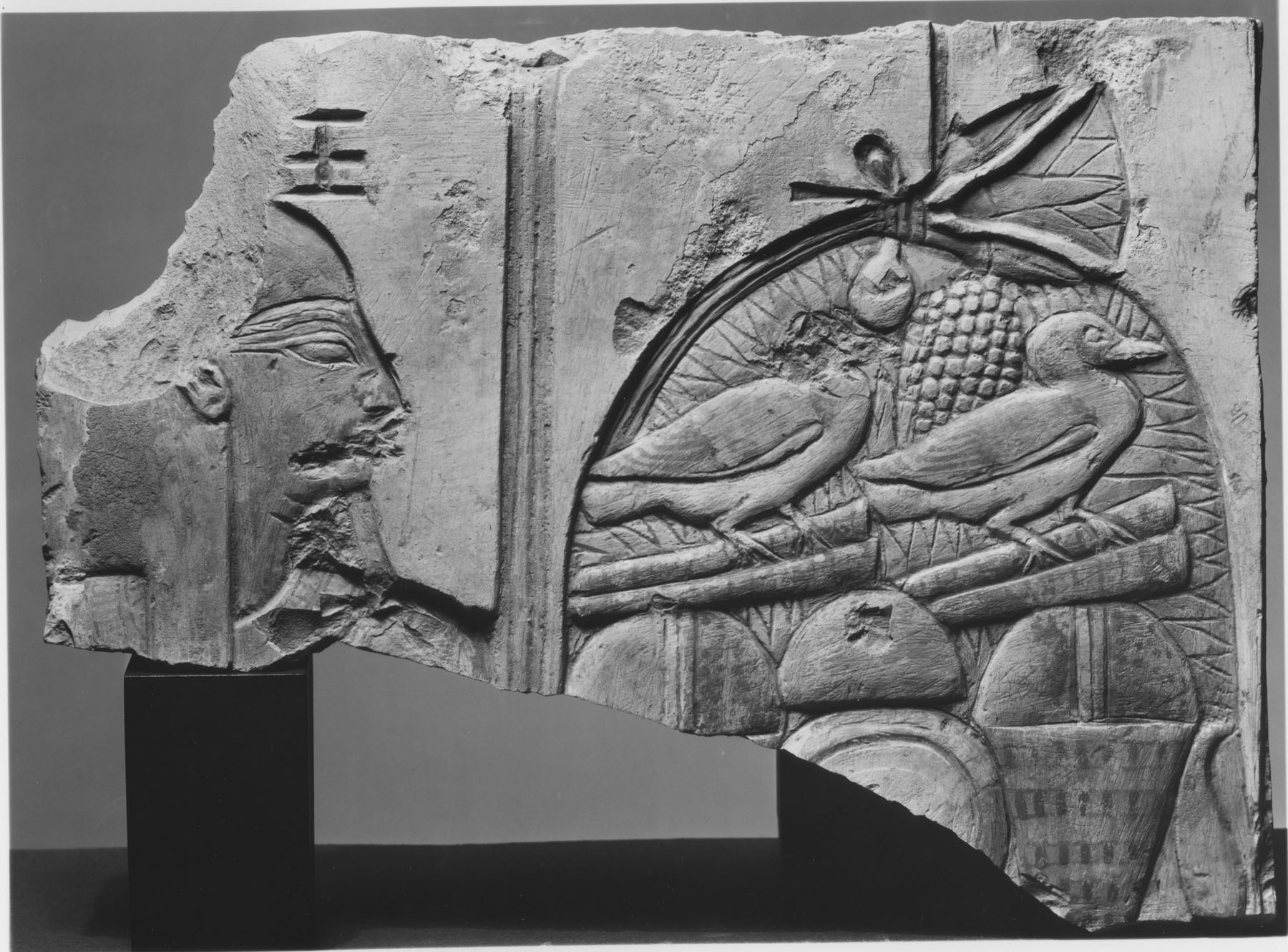 Fragment in Sunk Relief of Male Fecundity Figure Bearing Offerings