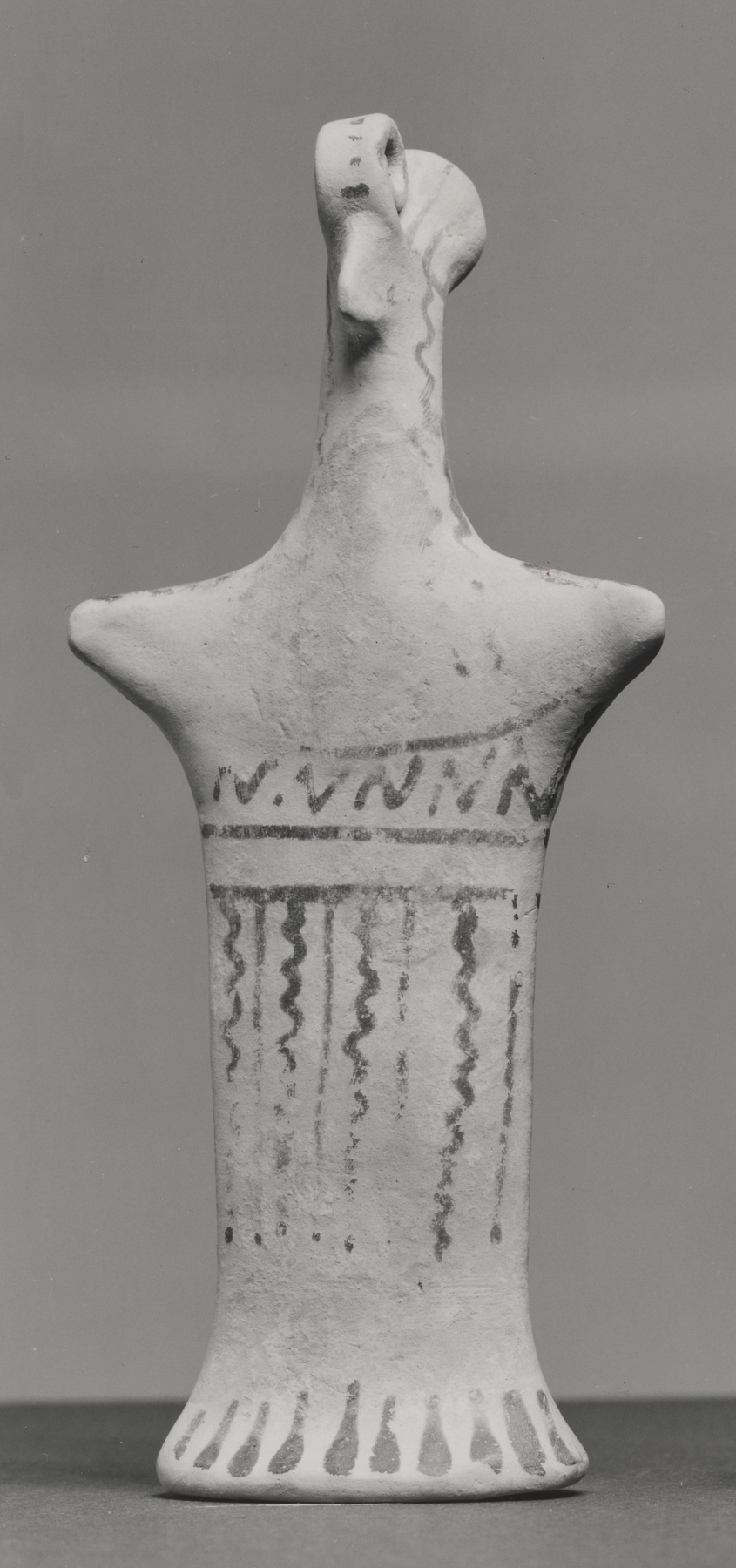 Figurine with Pinched Face and Geometric Decorations