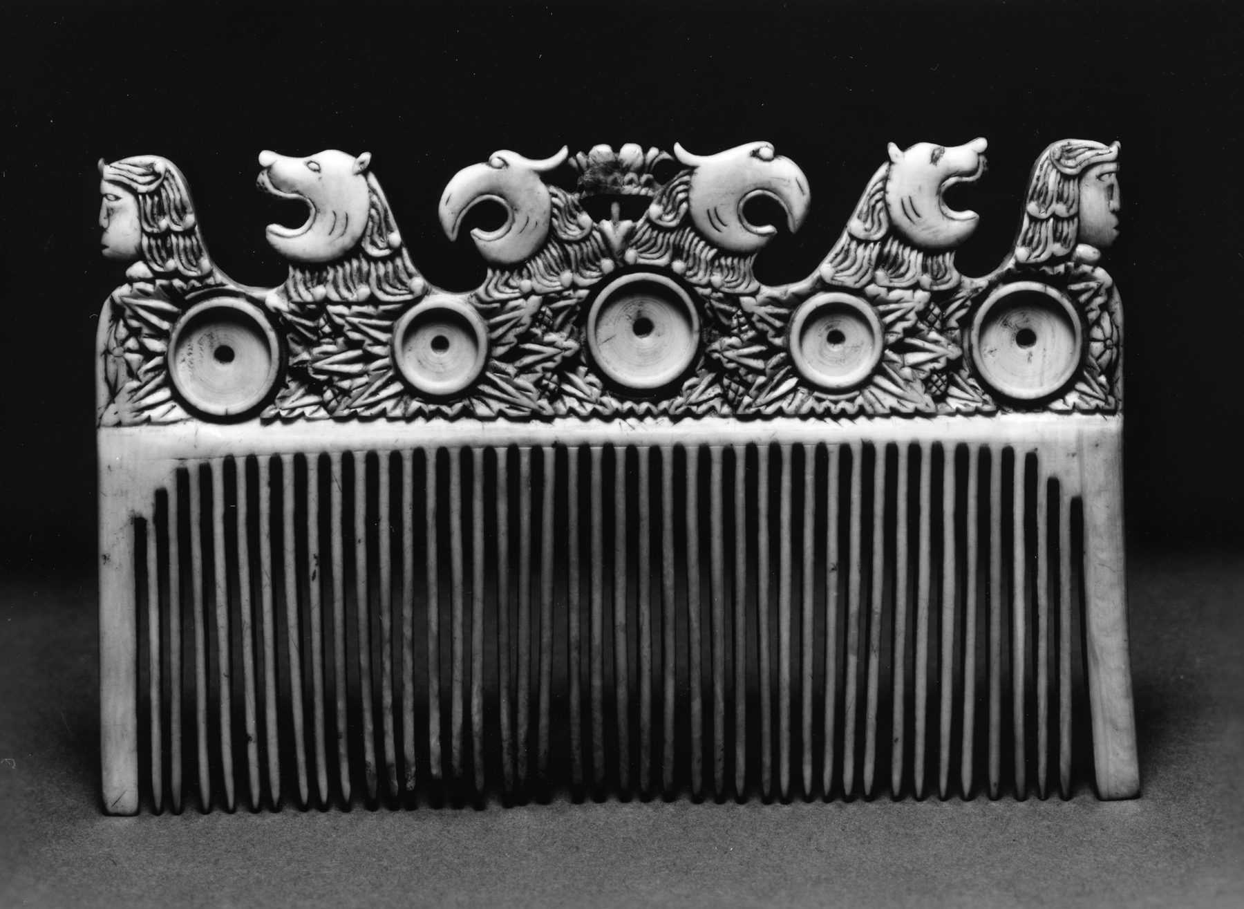 Comb with Warriors and Eagles