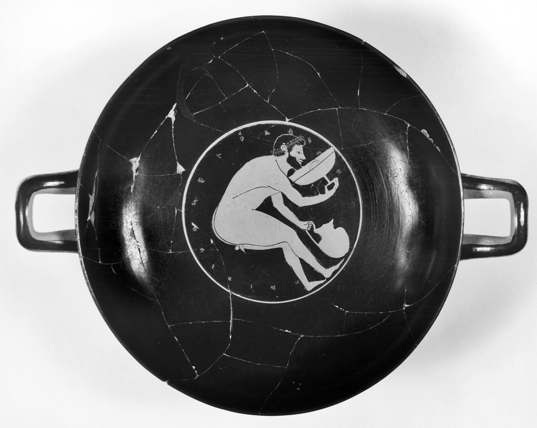 Kylix Depicting Men Bending Drinking from Kylix