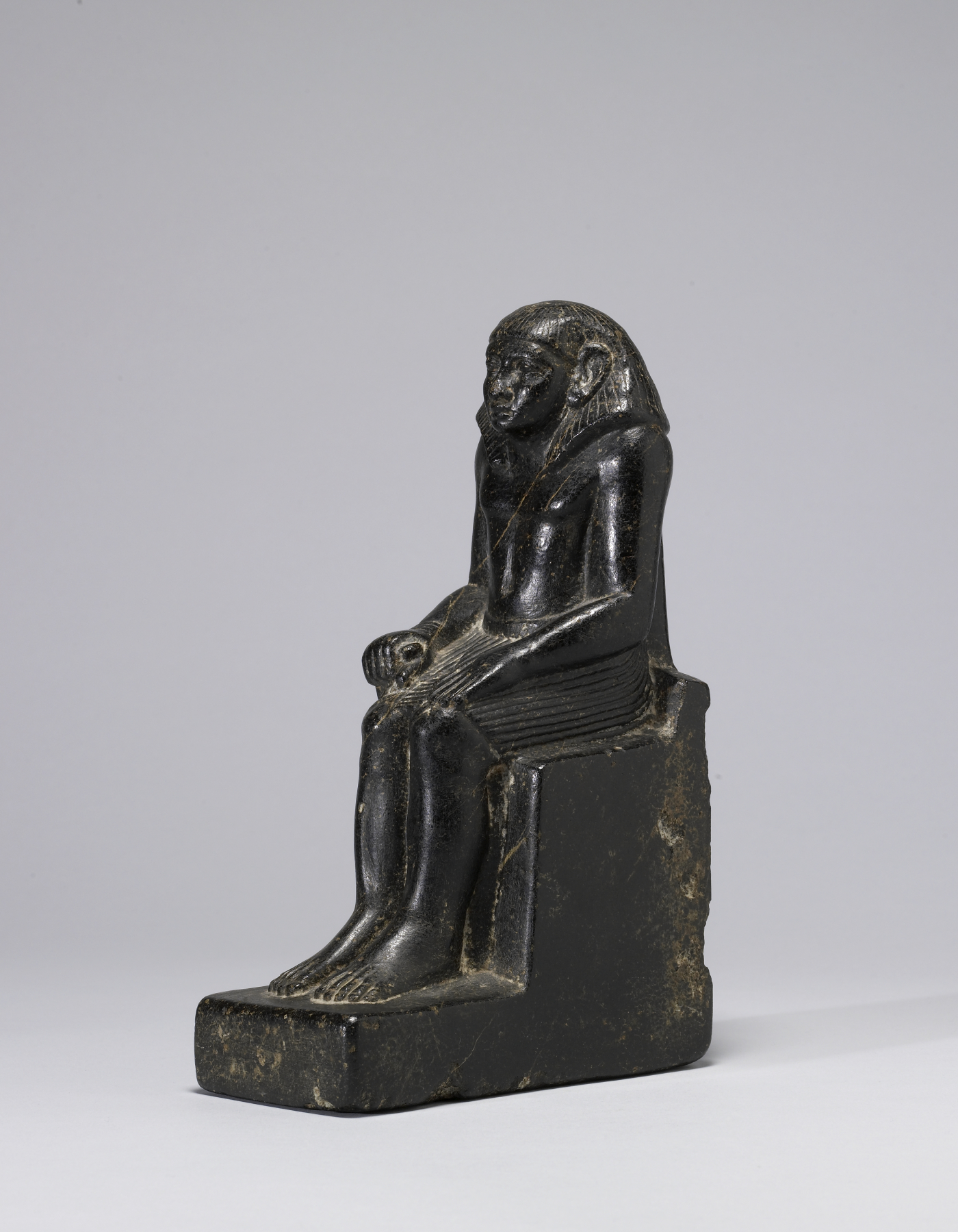 Male Figure Seated