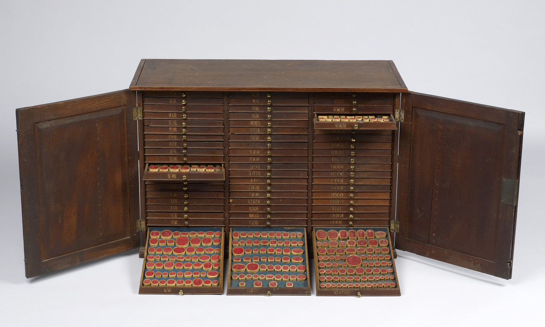 Oak Cabinet Containing Sixty Drawers of Gem Impressions in Red Sulphur