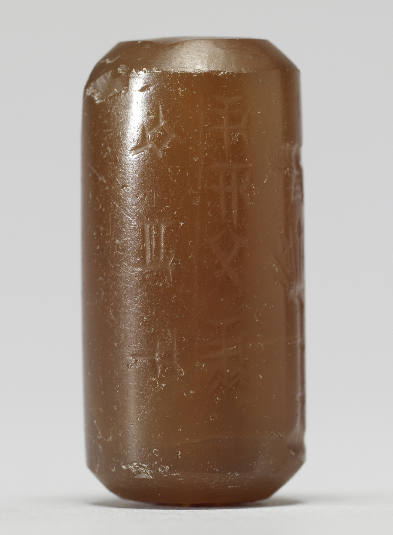 Cylinder Seal with a Worshipper and an Inscription